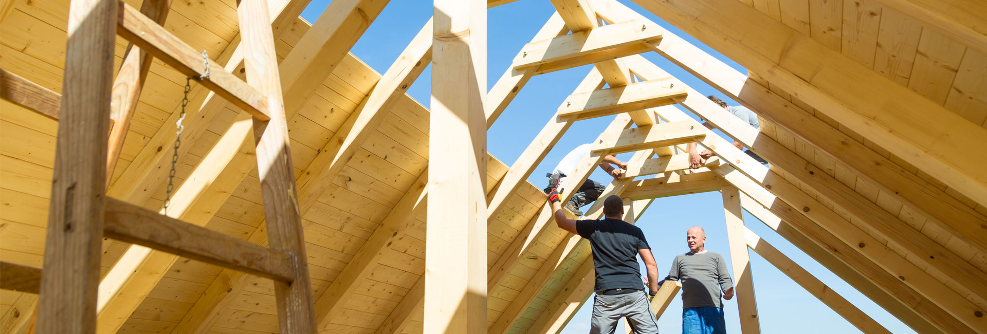 Workers Working on Roofing